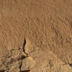 A cracked and weathered stone surface.