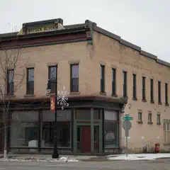 A two-story building with a brick facade and large windows, topped with a sign reading "Boyden Block".