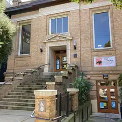 A brick building with a sign reading Public Library above the entrance.